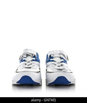 A new pair of white and blue trainers on a white background Stock Photo