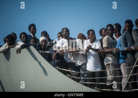 Salerno, Italy. 01st Sep, 2016. Landing in the port of Salerno of over a thousand migrants from sub-Saharan area, saved in the Mediterranean Sea, from the Spanish military ship Reina Sofia. Credit:  Ivan Romano/Pacific Press/Alamy Live News Stock Photo