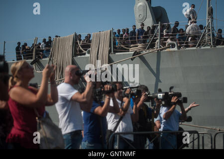 Salerno, Italy. 01st Sep, 2016. Landing in the port of Salerno of over a thousand migrants from sub-Saharan area, saved in the Mediterranean Sea, from the Spanish military ship Reina Sofia. Credit:  Ivan Romano/Pacific Press/Alamy Live News Stock Photo