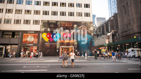 The Uniqlo store on Fifth Avenue in New York is decorated with a mural feating top seed tennis player Novak Djokovic, seen on Monday, August 29, 2016. The U.S. Open starts today in Queens and Uniqlo sponsors Djokovic. (© Richard B. Levine) Stock Photo