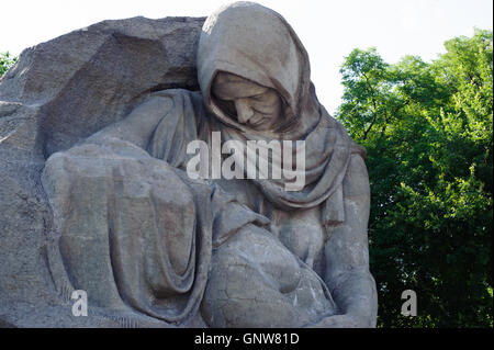 Volgograd, Russia - June 27, 2016: A figure of a sorrowful mother. Her figure is bent over her dead son fallen in the fight. Stock Photo
