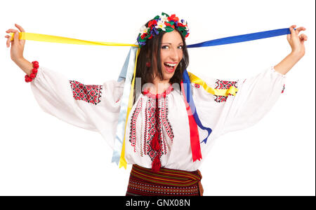 Attractive woman wears Ukrainian national dress is holding ukrai Stock Photo