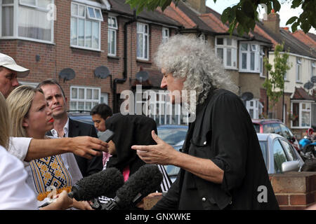 Feltham, London, England, UK. 1st September 2016.  Brian May from rock group Queen give an interview after unveiling an English Heritage Blue Plaque for the former lead singer Freddie Mercury. On what would have been Freddie's 70th birthday the Blue Plaque showing his birth name Fred Bulsara was unveiled on his former home at Feltham in West London, where he lived with his family in the 1970's. Credit:  Julia Gavin UK/Alamy Live News Stock Photo