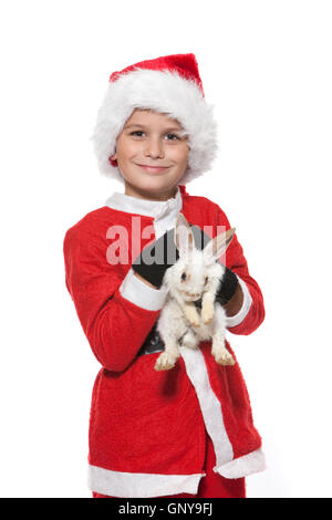 Boy holding a christmas rabbit Stock Photo