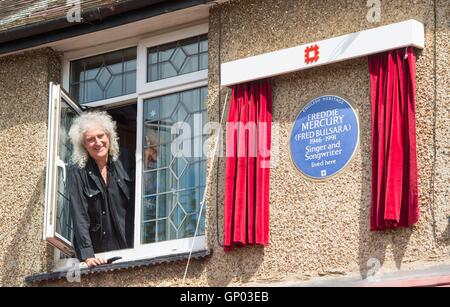 Queen guitarist Brian May at the unveiling of an English Heritage blue plaque to the band's lead singer, Freddie Mercury, at his former home at 22 Gladstone Avenue in Feltham, west London. Stock Photo