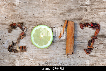 year 2017 written with different spices on wooden background Stock Photo