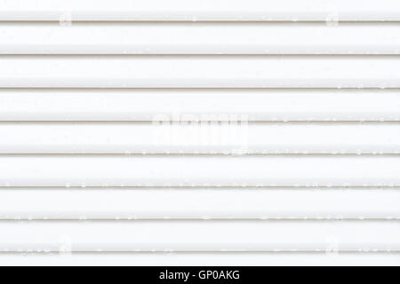 White aluminum awning with water rain drops. Outdoor white louver vents. Stock Photo