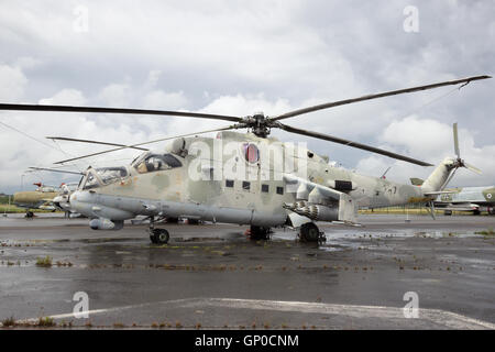 Former Eastern German Mi-24 Hind attack helicopter on display at the aviation museum in Gatow, Berlin Stock Photo