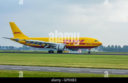 Polderbaan Schiphol Airport, the Netherlands - August 20, 2016: DHL cargo aircraft landing Stock Photo