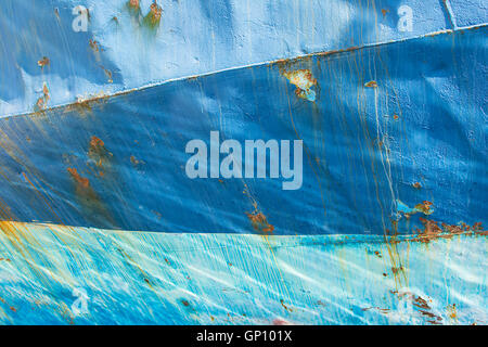 Old Blue Painted Metal. Abstract Vintage Background. Rusty Metal Texture With Cracked Paint. Three Shades of Blue. Stock Photo