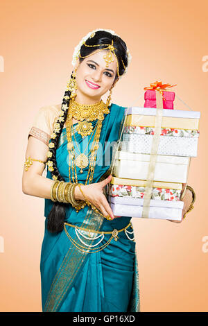 1 Beautiful Adult Bride Tamil Woman Diwali gift showing Stock Photo