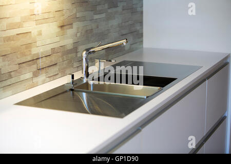 close up of modern stylish stainless steel kitchen sink Stock Photo