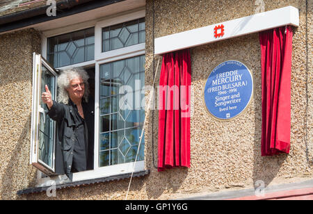 Queen guitarist Brian May at the unveiling of an English Heritage blue plaque to the band's lead singer, Freddie Mercury, at his former home at 22 Gladstone Avenue in Feltham, west London. Stock Photo