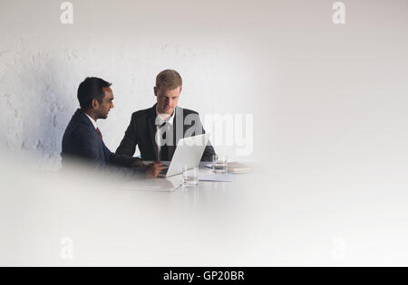 Focused on boardroom business Stock Photo