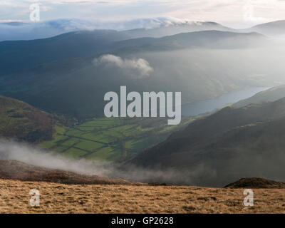 Hazy view to Llyn Mwyngil (aka Tal-y-llyn Lake) from Mynydd Moel, a subsidiary summit of Cadair Idris in Snowdonia National Park Stock Photo