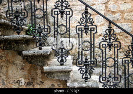 Old Town of Budva, Montenegro - Old stone stairs with wrought iron railings Stock Photo