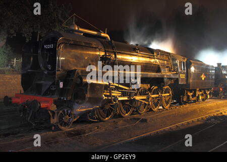 92212, preserved British Railways Engine 92212, 2-10-0 BR Standard Class 9F in steam at night. Stock Photo