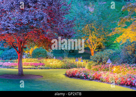 Sunken Garden illuminated at night, Butchart Gardens, Brentwood Bay, Greater Victoria, British Columbia, Canada Stock Photo