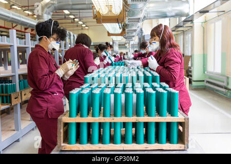 Sopot, Bulgaria - May 17, 2016: Arsenal women workers are producing weapons in one of Bulgaria's arms factory. The facility prod Stock Photo