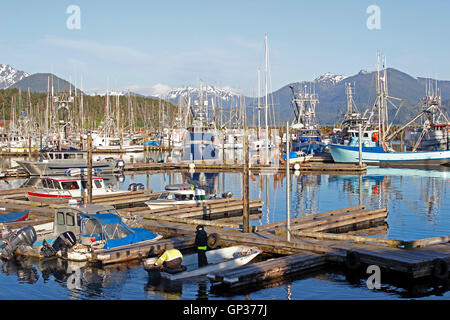 Fishing fleet Crescent Harbor marina mountains Sitka Alaska Inside Passage Southeast Alaska USA Stock Photo