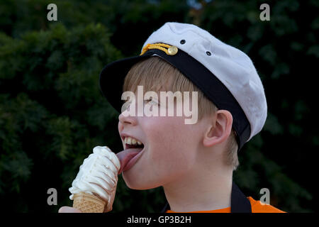 portrait of a young boy eating ice cream Stock Photo