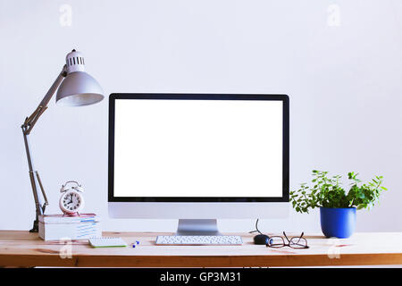 beautiful workplace, computer with white blank empty screen, home office interior Stock Photo