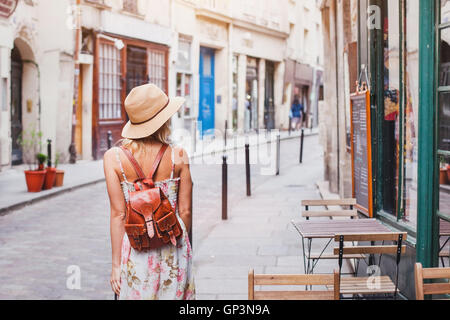 woman tourist on the street, summer fashion style, travel to Europe Stock Photo