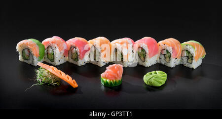 Mix of fresh Uramaki Sushi rolls, party set Stock Photo