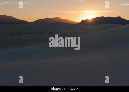 Sunset over dunes at White Sands National Monument, New Mexico, USA Stock Photo