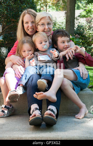 Grandmother with her daughter and grandchildren, portrait Stock Photo