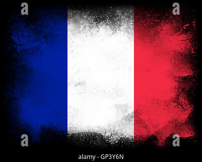 Powder paint exploding in colors of France flag isolated on black background. Abstract particles explosion of colorful dust. Stock Photo