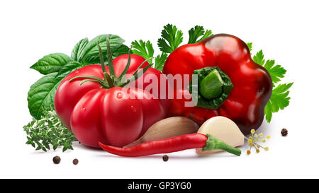 Fresh ribbed heirloom tomato with sweet bell pepper for pickling or canning with herbs, chili peppers and garlic. Clipping path, Stock Photo