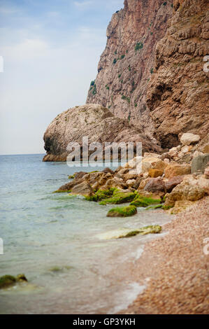 panoramic view of nice colorful huge cliff and sea on the back Stock Photo