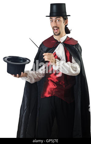 Magician doing tricks on white Stock Photo