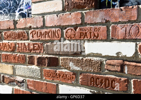 Part of the brick wall of fame at the Rainbow Bar and Grill on the Sunset Strip, West Hollywood; California. Stock Photo