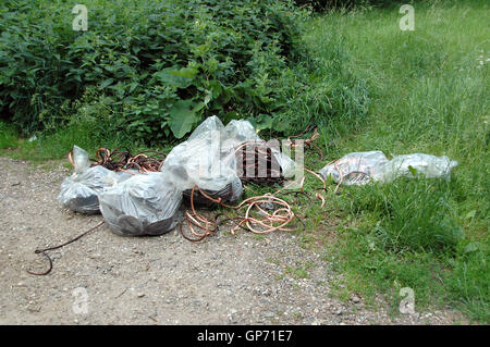 This is the loot of a copper theft, in total some 200 kilos. The thief's trailer broke down, he had to Jettison the loot. Stock Photo