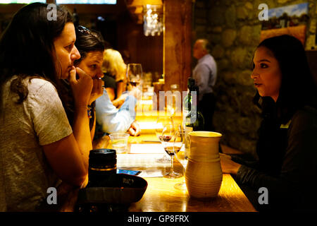 Visitors in a tasting session in Chateau Montelena winery.Calistoga,California,USA Stock Photo