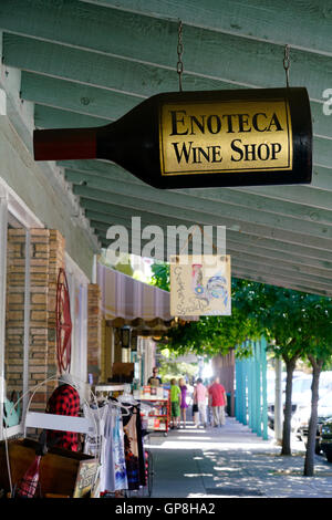 A wine bottle shaped sign of a local wine shop.Calistoga,California,USA Stock Photo