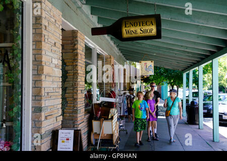 A wine bottle shaped sign of a local wine shop.Calistoga,California,USA Stock Photo