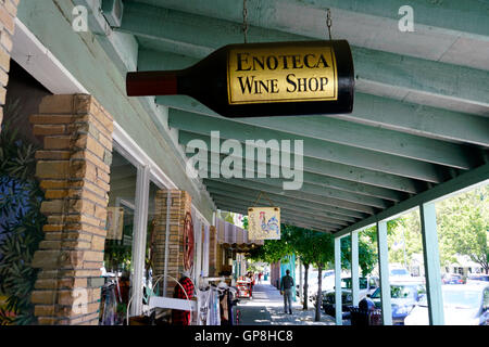 A wine bottle shaped sign of a local wine shop.Calistoga,California,USA Stock Photo