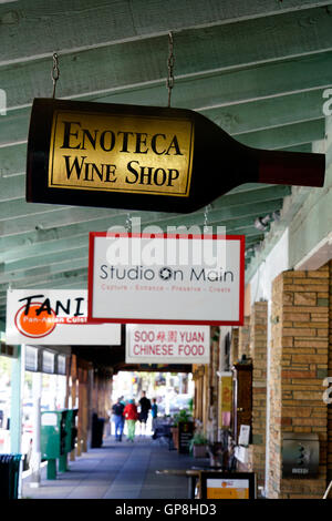 A wine bottle shaped sign of a local wine shop.Calistoga,California,USA Stock Photo