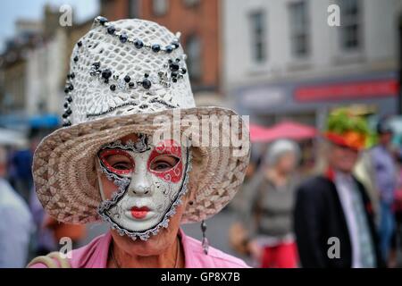 Bridport, Dorset, UK. 3rd September 2016. Thousands of hat wearers gather and promenade in Bridport during the seventh Annual Hat Festival. The Festival encourages residents and visitors to take part in hat related activities and and competitions including including most fun hat, best hatted dog, and most elegantly-hatted couple. Credit:  Tom Corban/Alamy Live News Stock Photo