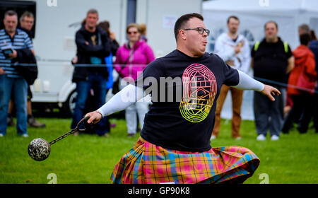 Peebles, Scotland UK  3rd September 2016. Peebles Highland Games, the biggest 'highland' games in the Scottish  Borders took place in Peebles on September 3rd 2016 featuring pipe band contests, highland dancing competitions, haggis hurling, hammer throwing, stone throwing and other traditional events.    Pictured:  a competitor throwing the ball and chain Credit:  Andrew Wilson/Alamy Live News Stock Photo