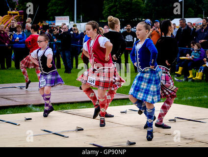 Peebles, Scotland UK  3rd September 2016. Peebles Highland Games, the biggest 'highland' games in the Scottish  Borders took place in Peebles on September 3rd 2016 featuring pipe band contests, highland dancing competitions, haggis hurling, hammer throwing, stone throwing and other traditional events.  Pictured:  Highland dancing competition in progress Credit:  Andrew Wilson/Alamy Live News Stock Photo