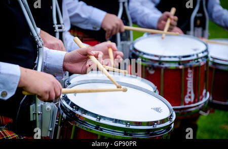 Peebles, Scotland UK  3rd September 2016. Peebles Highland Games, the biggest 'highland' games in the Scottish  Borders took place in Peebles on September 3rd 2016 featuring pipe band contests, highland dancing competitions, haggis hurling, hammer throwing, stone throwing and other traditional events.  Pictured:   pipe band drum core Credit:  Andrew Wilson/Alamy Live News Stock Photo