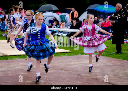 Peebles, Scotland UK  3rd September 2016. Peebles Highland Games, the biggest 'highland' games in the Scottish  Borders took place in Peebles on September 3rd 2016 featuring pipe band contests, highland dancing competitions, haggis hurling, hammer throwing, stone throwing and other traditional events.  Pictured:  Highland dancing competition in progress Credit:  Andrew Wilson/Alamy Live News Stock Photo