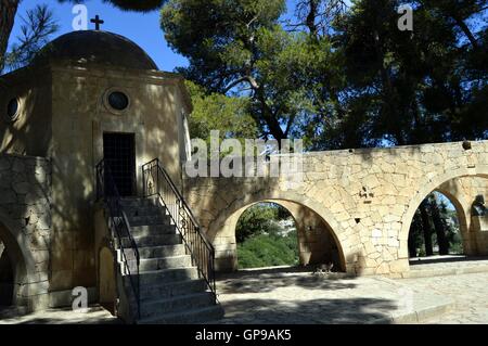 A small white chapel with a bell. Stock Photo