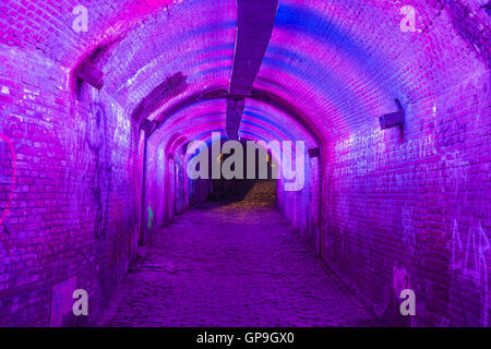 Purple and pink illuminated Ganzemarkt tunnel on June 30, 2016 in the centre of Utrecht, The Netherlands Stock Photo