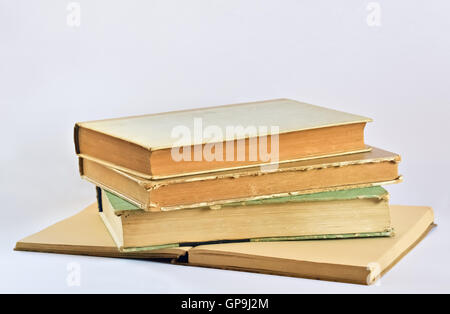 Closeup of several old books on bright background Stock Photo