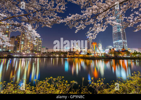 cherry blossom in Lotte World amusement park at night ,Seoul korea Stock Photo